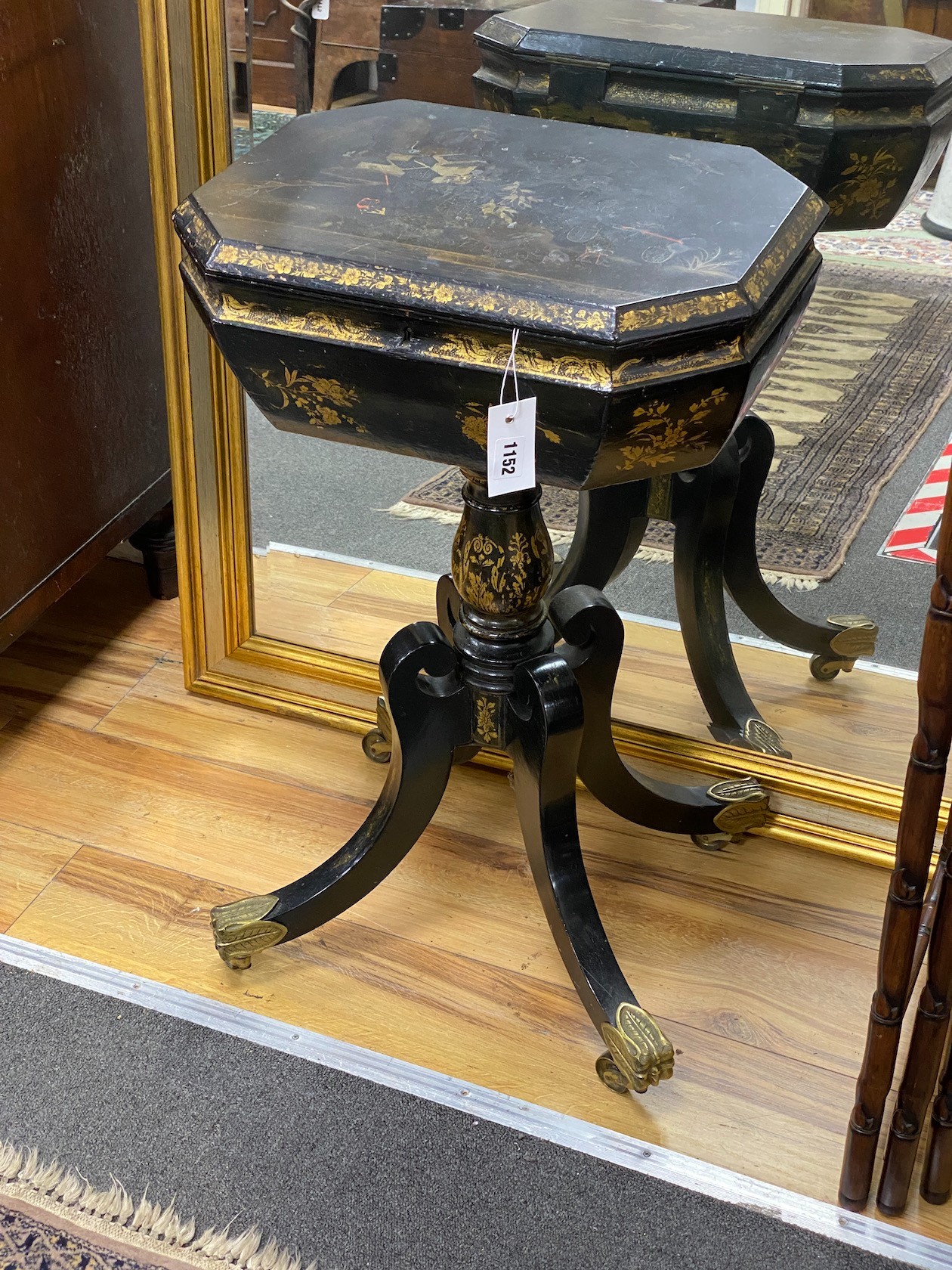 A 19th century chinoiserie lacquer octagonal teapoy, width 46cm, depth 33cm, height 74cm